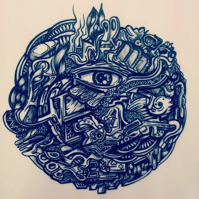 Intricate circular ink drawing of a central eye surrounded by dense psychedelic patterns and bold lines