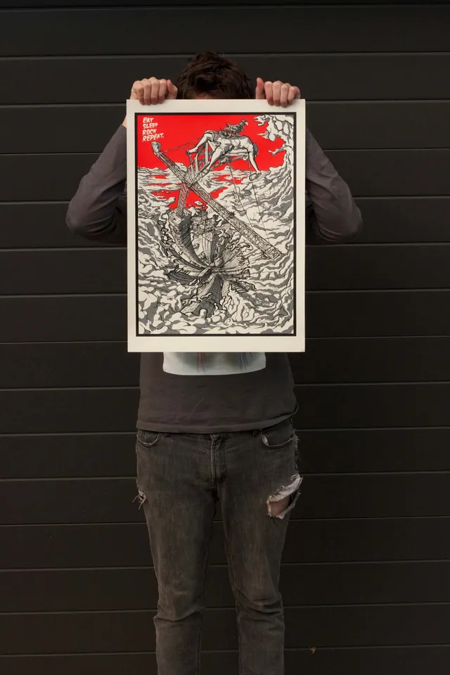 Mate holding UD3 screen printed poster up