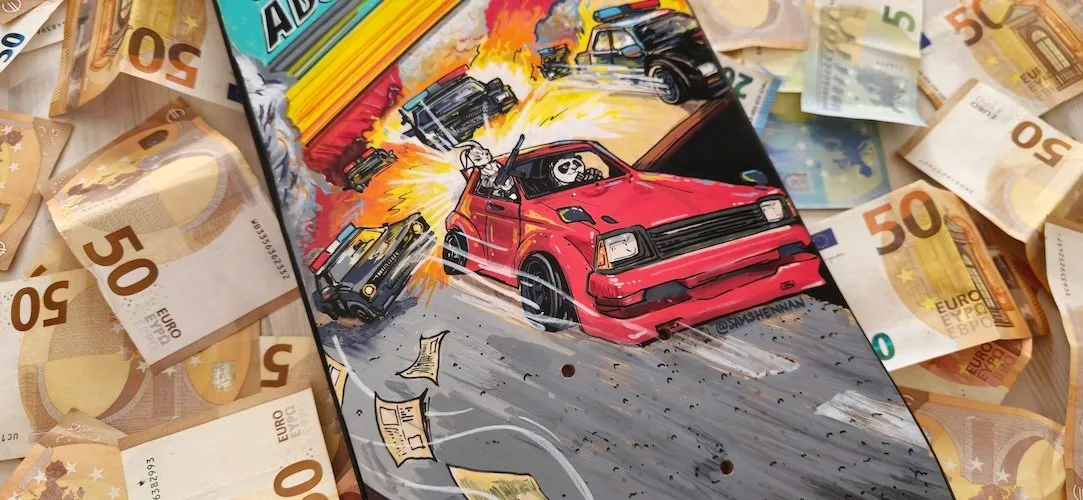 Painted skateboard with a panda and rabbit in a red car fleeing police amid explosions, resting on Euro banknotes
