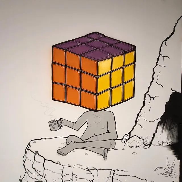 Illustration of a meditating figure with a giant Rubik's Cube head holding a steaming skull mug on a cliff edge