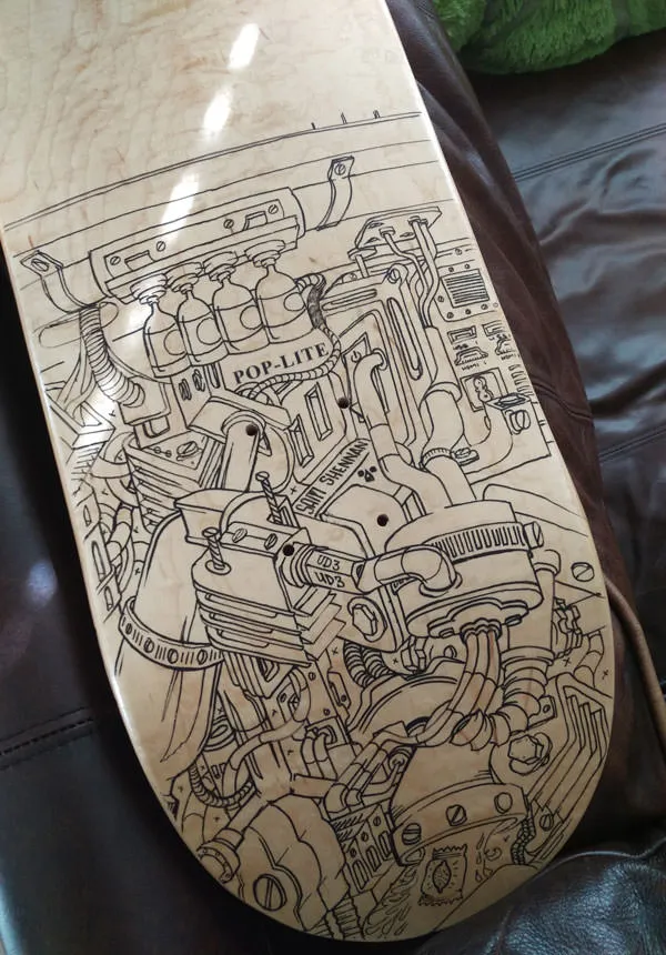 Process of hand painting skateboard progress