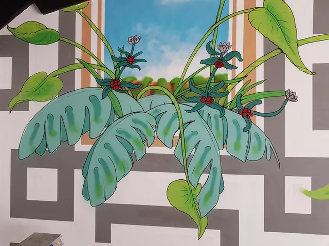 Mural of stylized coffee plants and large leaves painted over a grey geometric pattern and faux window with blue sky