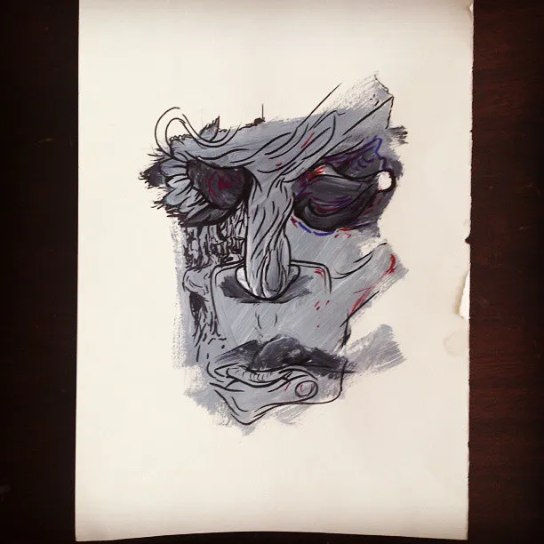 Ink and grey paint sketch on paper of a stylized face with dark eyes and bold line work