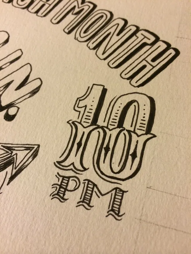 Ink sketch of bold hand-lettering reading 10 PM and MONTH on textured paper with pencil guidelines