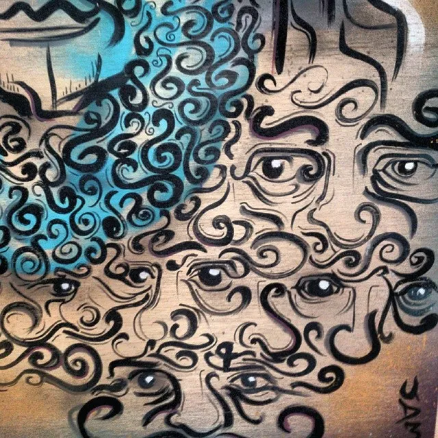 Painted illustration of overlapping faces and eyes connected by dense, swirling black linework and a patch of blue