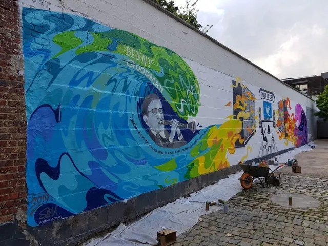 Long outdoor mural featuring Benny Goodman playing clarinet surrounded by swirling blue and green abstract shapes