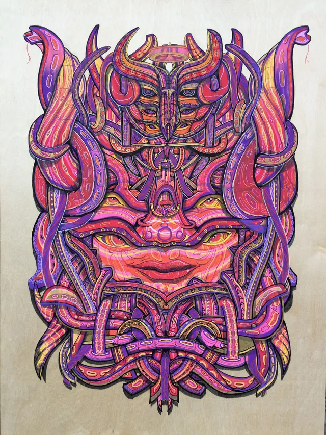 Psychedelic pink and purple illustration on wood of a symmetrical totemic face with multiple eyes and tentacles