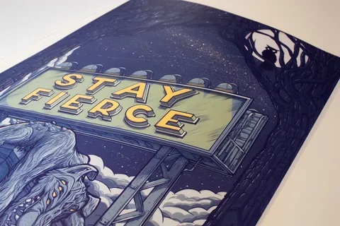 Poster print of a STAY FIERCE billboard at night, featuring a multi-eyed wolf and a silhouetted owl in a tree