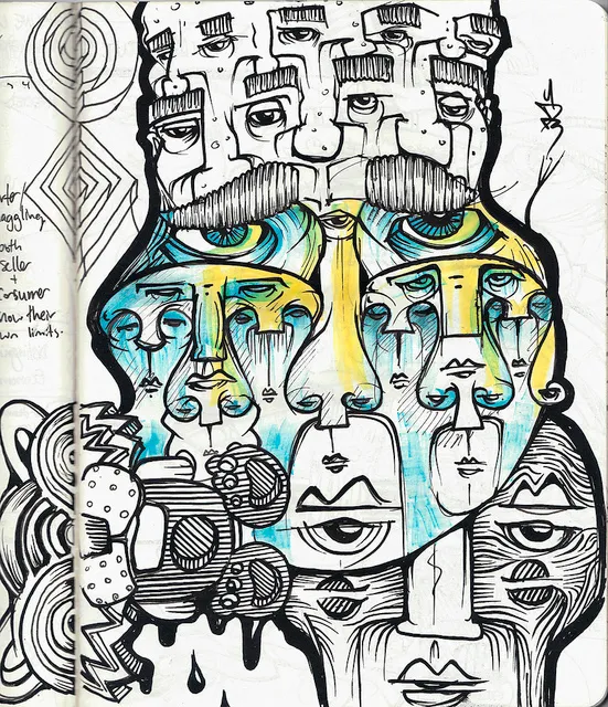Sketchbook ink drawing of overlapping surreal faces with bold black lines and blue and yellow accents