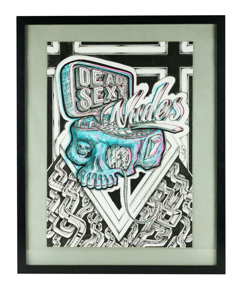 Framed ink drawing of a cyan and pink skull telephone below text reading DEAD SEXY Nudes