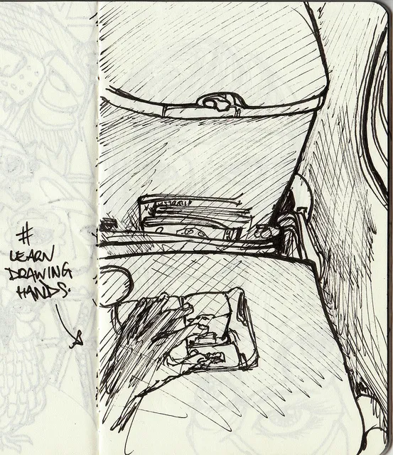 Ink sketchbook drawing of an airplane tray table and hand, with a handwritten note reading # LEARN DRAWING HANDS