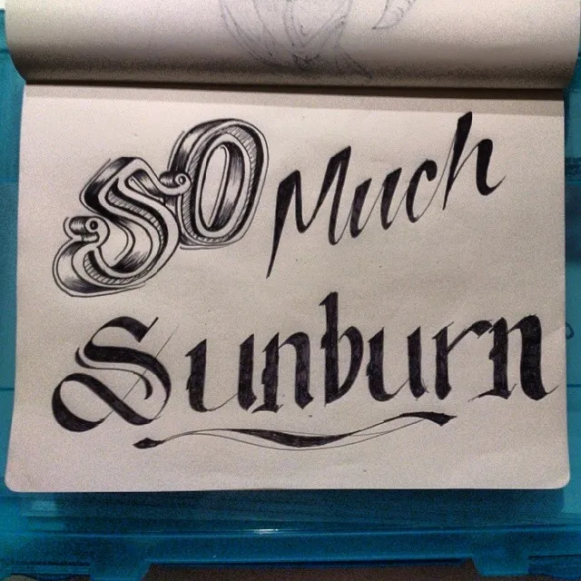 Ink sketchbook drawing of hand-lettered text reading SO Much Sunburn in mixed 3D, script and blackletter styles