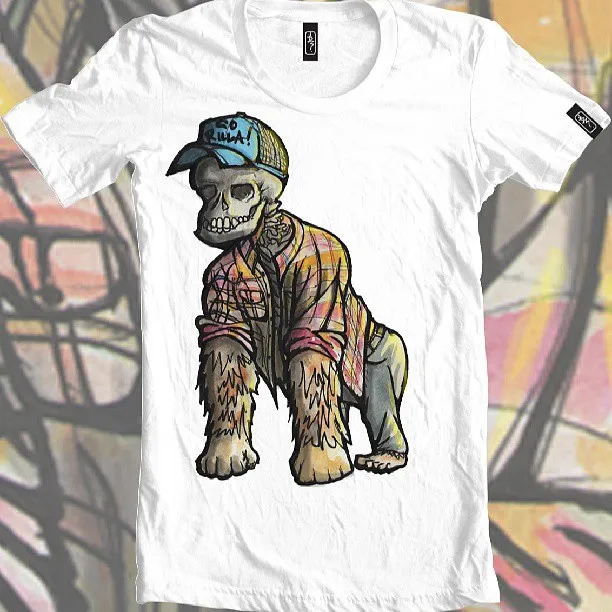 T-shirt illustration of a skull-faced gorilla wearing a plaid shirt and a blue trucker hat reading GO RILLA!