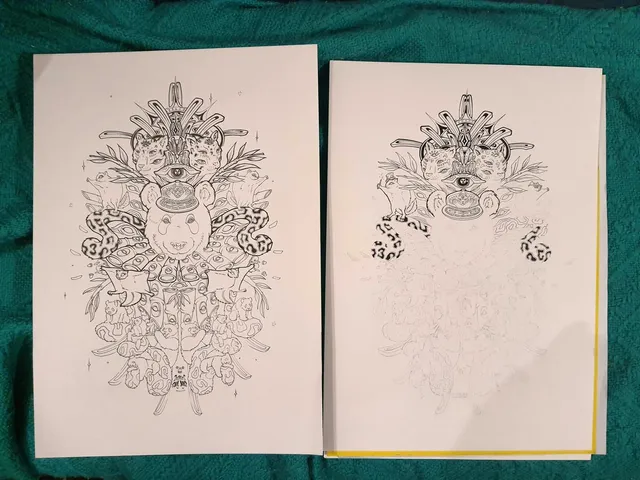 Finished and in-progress ink drawings on paper of a symmetrical panda shaman with snakes and eyes