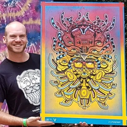 Artist with his work