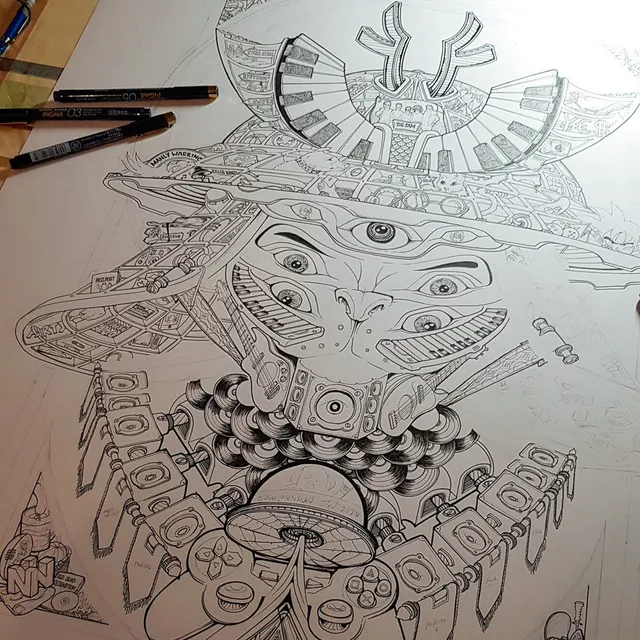 Work-in-progress ink drawing of a highly detailed, multi-eyed totemic figure incorporating speakers and game controllers
