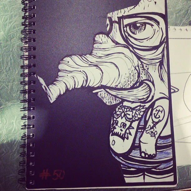 Sketchbook ink drawing of a surreal tattooed character with glasses and a large trunk-like nose smoking a cigarette