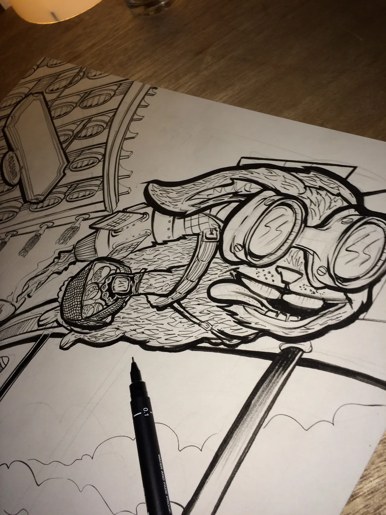 Black ink drawing of a crazed hare wearing goggles and a jetpack, with a fineliner pen resting on the paper