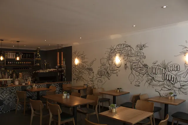 Coffee maker and new mural interior design artwork for cafe