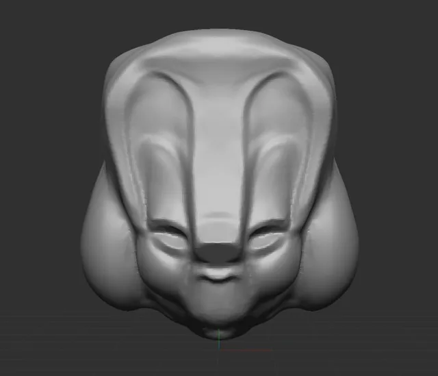 3D sculpt of a stylized, symmetrical totemic face with slit eyes and elongated features