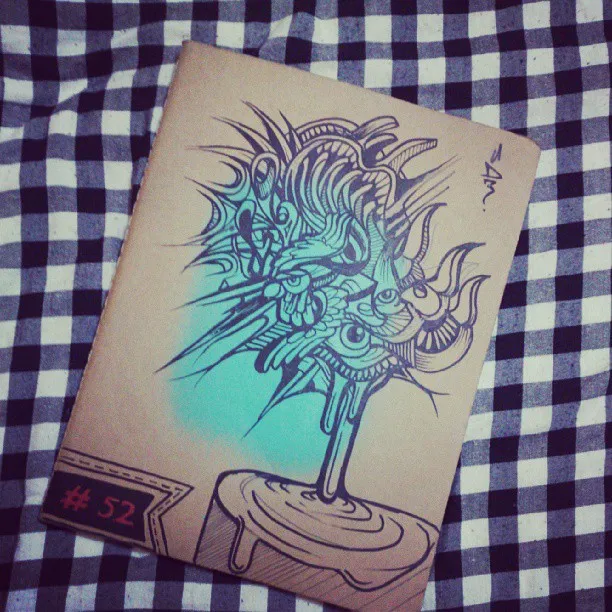 Ink drawing on tan paper of a psychedelic, abstract cluster of eyes, spikes, and tentacles melting into a puddle