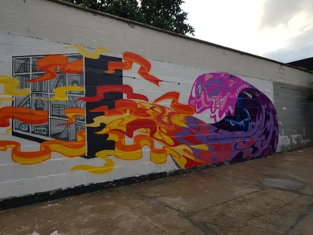Mural of a black and white stereo emitting colorful psychedelic waves toward a portrait of Leonard Cohen