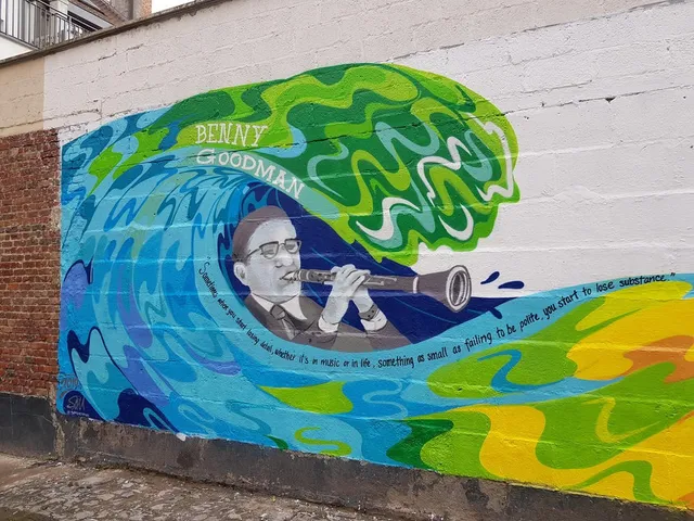 Mural of Benny Goodman playing clarinet surrounded by swirling psychedelic blue, green, and yellow waves