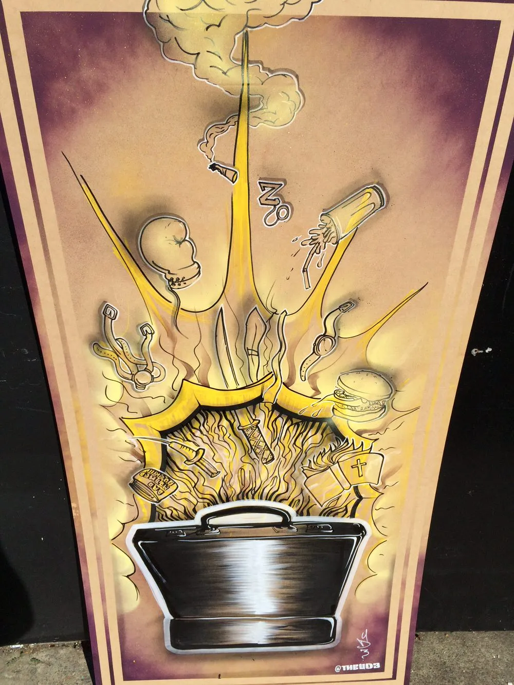 Painting of a black briefcase erupting with yellow light, shooting out a boxing glove, burger, knives and a bible