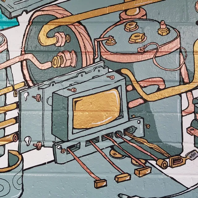 Painted brick wall mural featuring stylized mechanical espresso machine parts, copper pipes and bold black linework