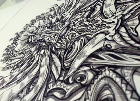 Close-up of a black ink drawing of a psychedelic lionfish shaman featuring intricate swirling fins and bold linework