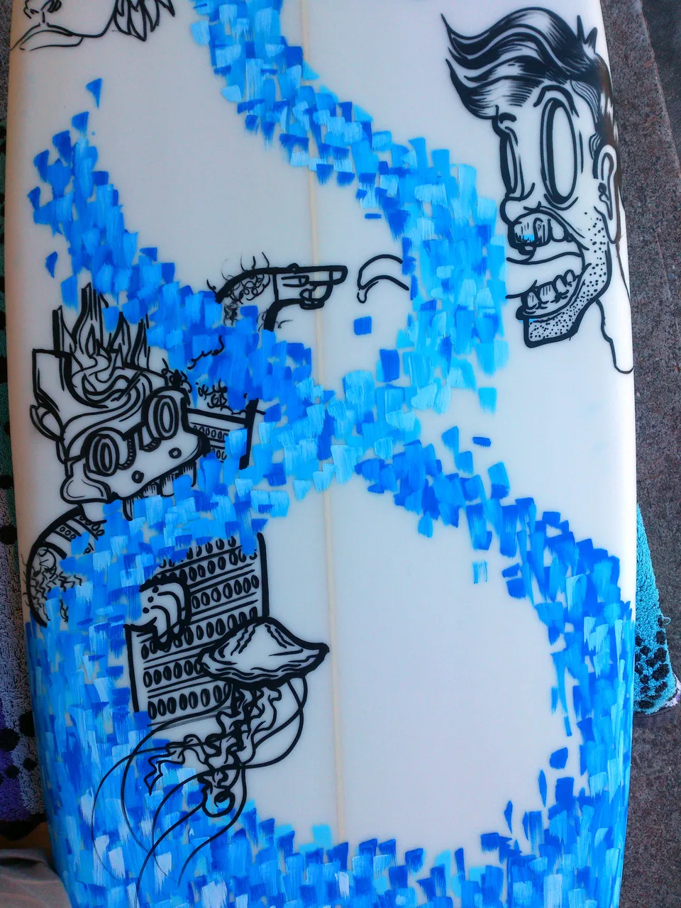 Painted surfboard featuring black line art of surreal characters and a jellyfish amidst swirling blue brushstrokes