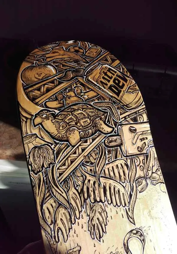 Hand-painted skateboard with bold black and white line art of a turtle in sunglasses and a Mtn Dew can on wood
