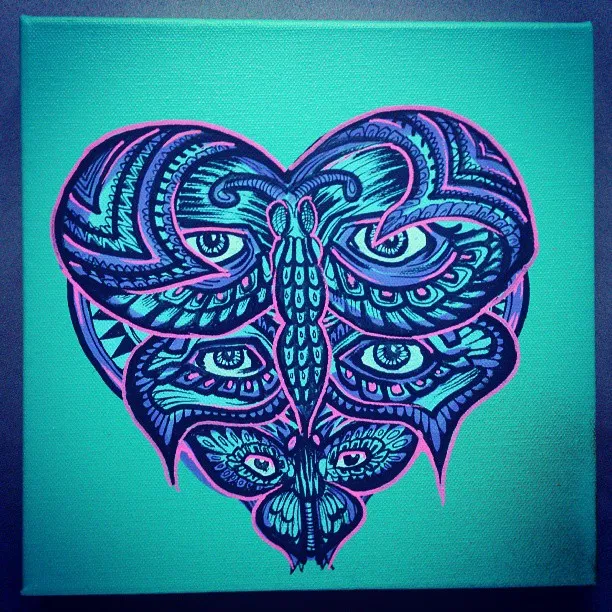 Canvas painting of a symmetrical, psychedelic heart-shaped butterfly with multiple eyes, outlined in pink on teal