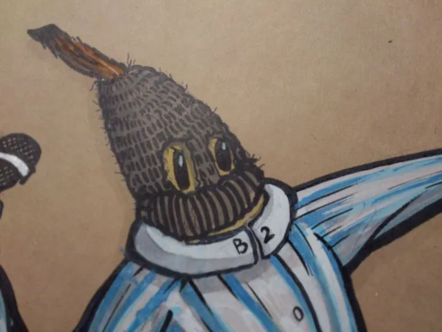 Illustration on brown paper of a character in striped pyjamas with B2 on the collar wearing a textured brown mask