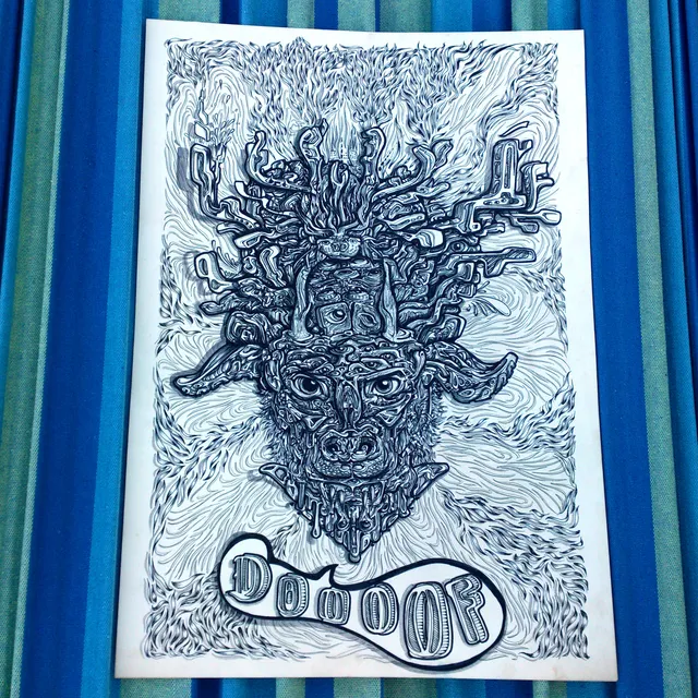 Ink drawing of a psychedelic, totemic horned beast face with intricate swirling lines and stylized bubble lettering