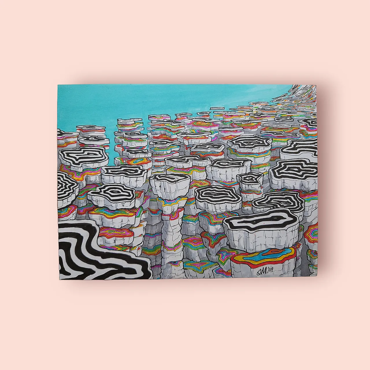 Canvas painting of tall pillars with black and white wavy tops and bright rainbow-layered sides under a blue sky