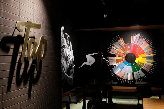 Tap Cafe interior design mural and metal cut out signage for trendy cafe