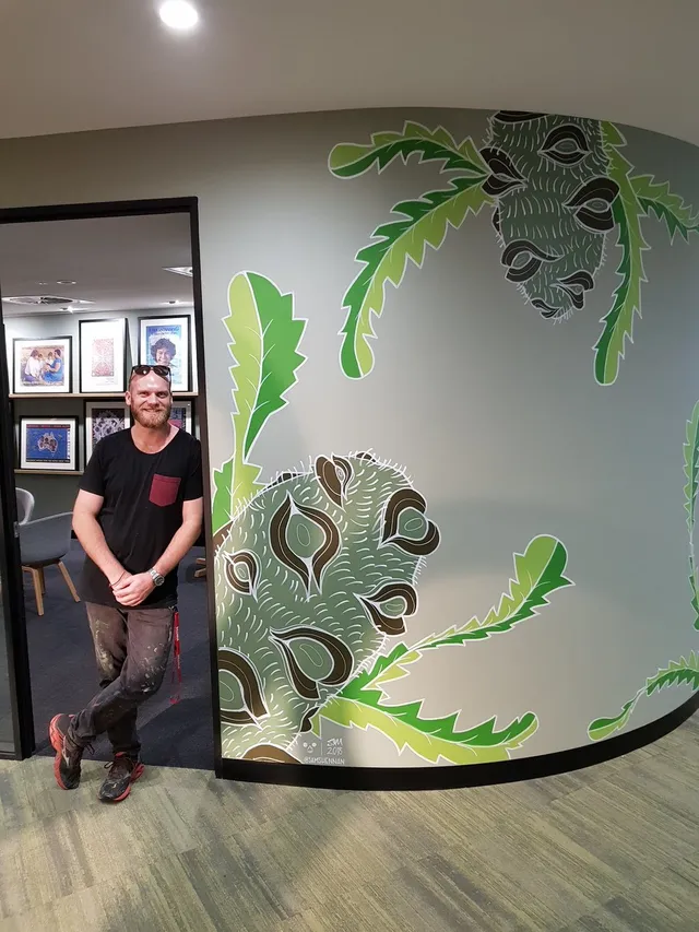 The artist with his work