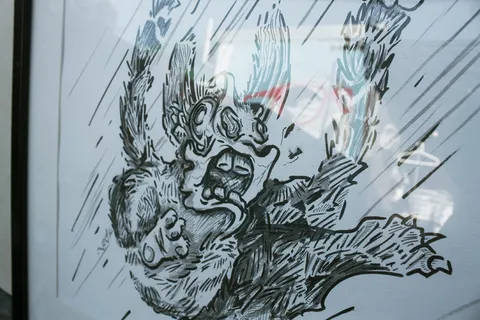 Framed ink drawing of a panicked furry character flailing as it falls rapidly amidst bold action lines