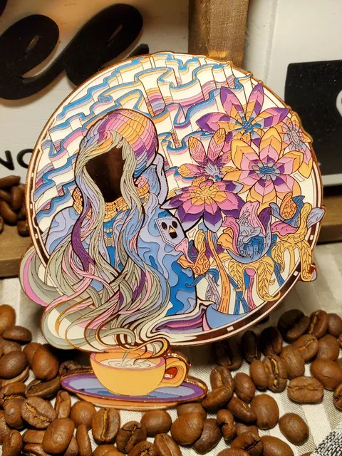 Enamel pin of a faceless hooded figure, psychedelic flowers and a coffee cup, resting on roasted coffee beans